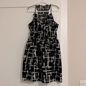 Racer back printed sundress with back slit cut outs.